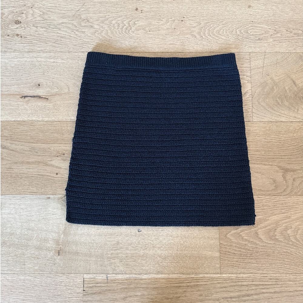 H:ours - Ribbed Knit Mini Skirt with Side Peep Holes in Black